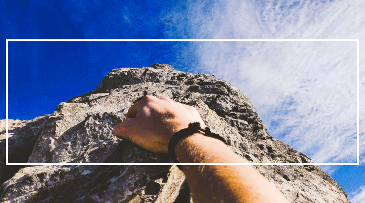 Man Climbing with Paracord Bracelet