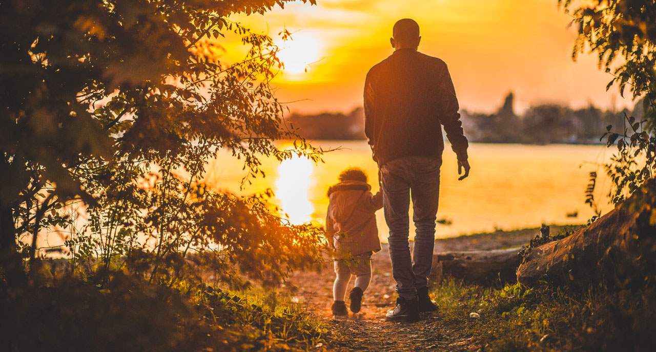 Father walking daughter