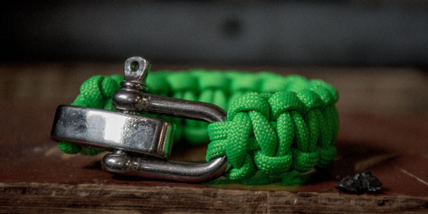 green bracelet with shackle